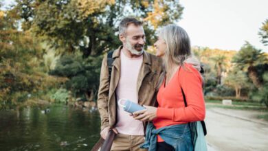 Mindful dating couple walking in park