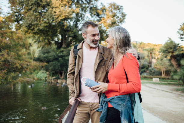 Mindful dating couple walking in park
