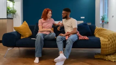 Couple discussing attachment styles in relationships at home