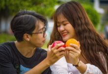 Healthy relationship signs with couple laughing