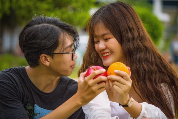 Healthy relationship signs with couple laughing