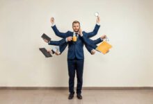 Person struggling with the hidden cost of multitasking