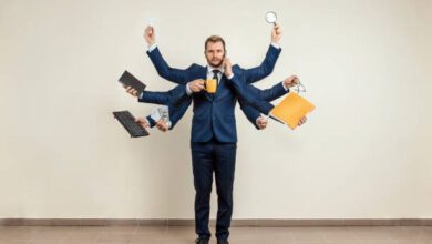Person struggling with the hidden cost of multitasking