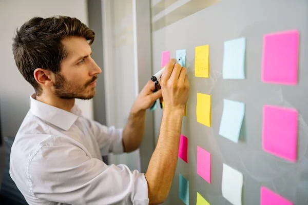 Person struggling with the hidden cost of multitasking