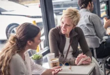 Parent and teen talking over coffee