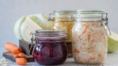 Probiotic supplement bottle with healthy foods to support gut health