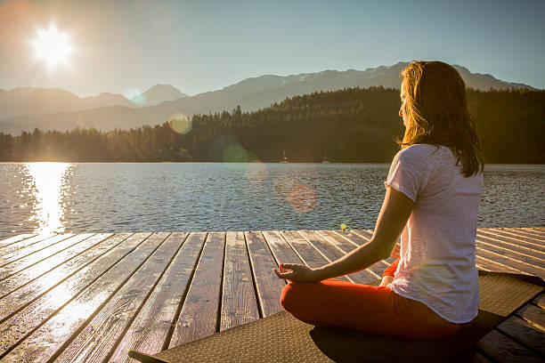 Person practicing mindfulness in calm vs headspace 2025 journey